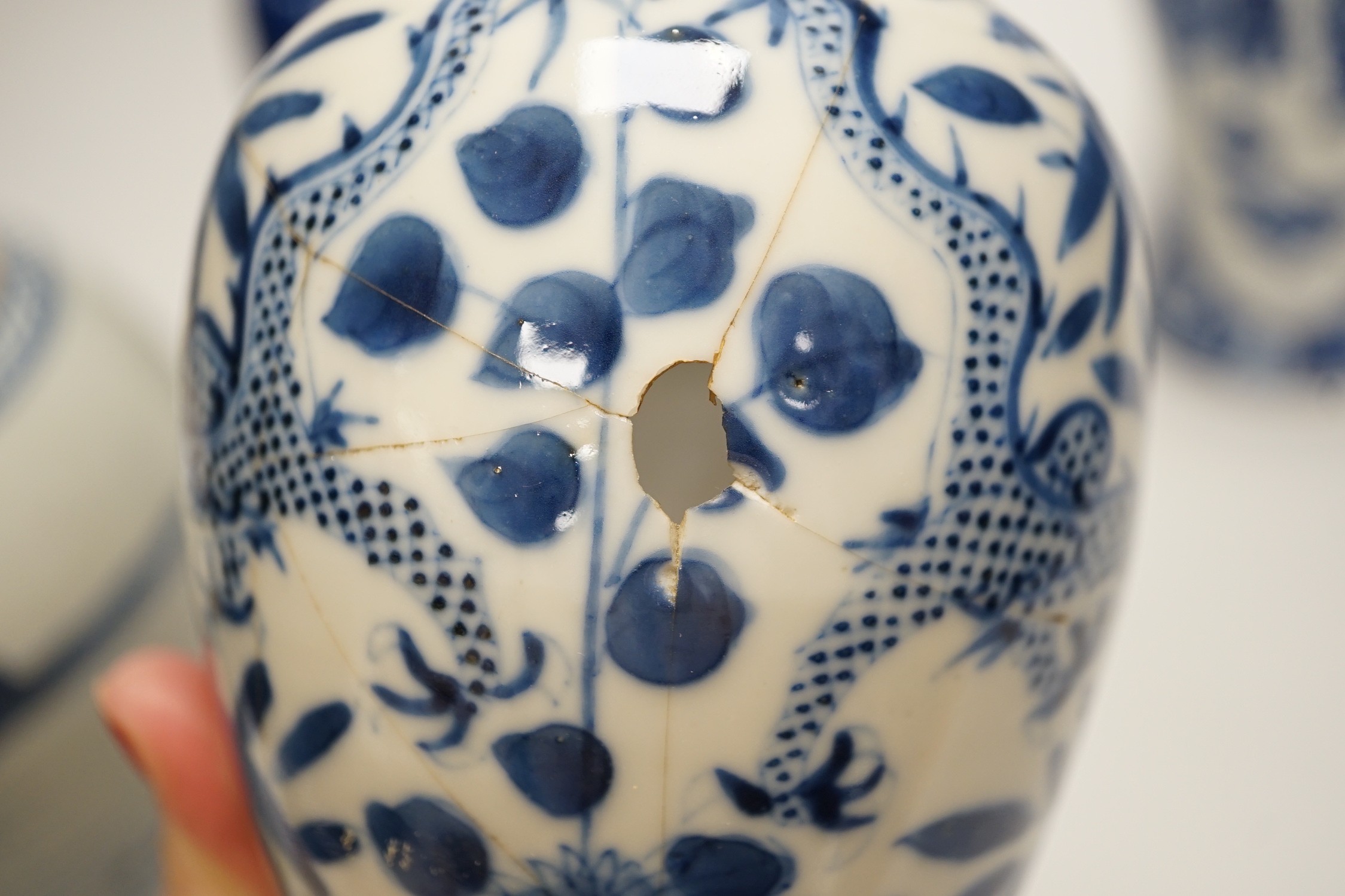 Three Chinese blue and white vases and a similar jar, 19th century, tallest 22.5 cm